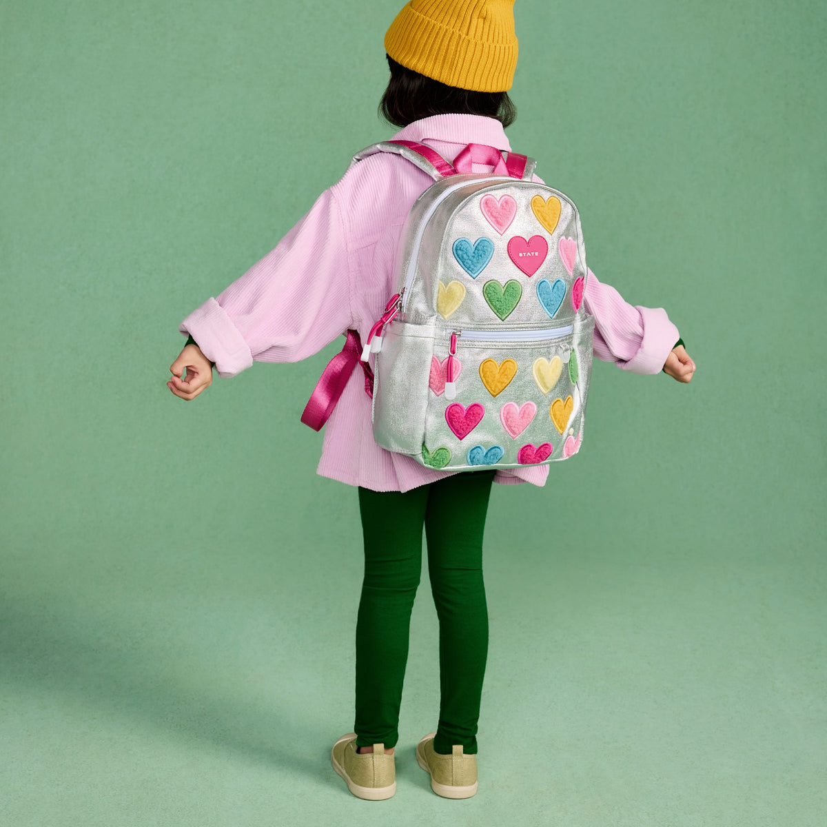 State Bags Kane Mini Backpack Metallic Happy Fuzzy Hearts